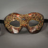 Metallic rust red lace mask with Swarovski crystals and assorted gems. Detail.