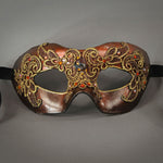 Metallic rust red lace mask with Swarovski crystals and assorted gems. Detail.