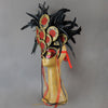 Become a Goddess at your next masquerade party in this stunning Red, black and gold Fire Sylph Masquerade Mask! This is an avant-garde piece with a crest of hand made paper panels in a peacock motif laying over pitch black coque feathers. Embellished with Swarovski crystals, and polished stones.  Handmade in the USA using traditional Venetian paper-mache technique. Lined with hypoallergenic stretch velvet for comfort. Side view
