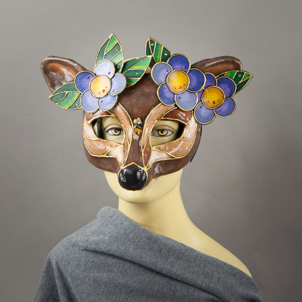 Deer Mask with paper-mache flowers, Swarovski crystals and assorted gems. 