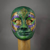 Green Steampunk Droid Mask. This unique piece is hand painted in shades of green and accented in purple and gold. Details include Swarovski Crystals, metal findings and assorted watch gears.  Handmade in the USA using the traditional Venetian paper mache process. Lined with soft stretch velvet for comfort.