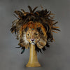 Stunning Lion Mask with a luxe crest of natural coque and assorted pheasant plumage. Embellished with Swarovski crystals, and assorted polished gem stones. Sure to turn heads at any costume, masquerade or Halloween party!  Hand-made in the USA using traditional Venetian paper-mache technique. Lined with hypoallergenic stretch velvet for comfort.
