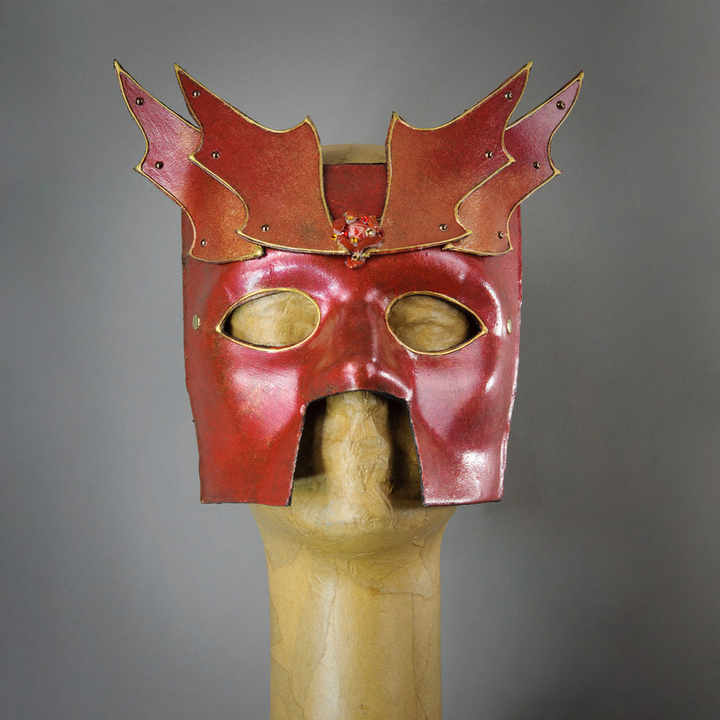 Bronze Warrior Bauta Masquerade mask, with panel armor, metal findings and assorted polished gems. Inspired by medieval armor, this mask is particularly popular for men.  Handmade in the USA using traditional Venetian paper-mache technique. Lined with hypoallergenic stretch velvet for comfort.